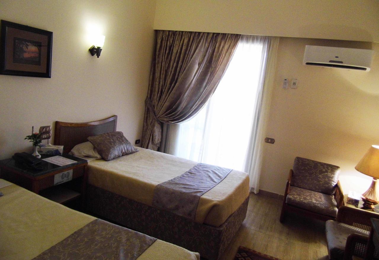 Mg Nefertiti Hotel Ель-Мінья Номер фото