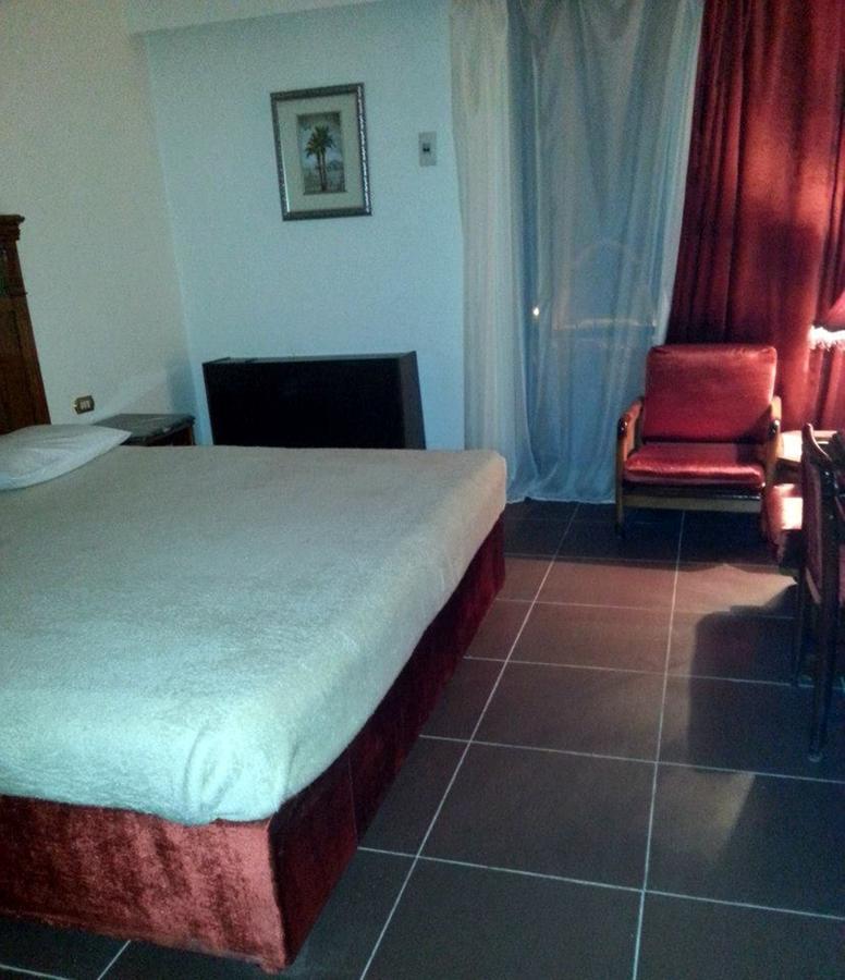 Mg Nefertiti Hotel Ель-Мінья Номер фото